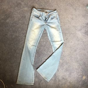 Kick boot style light washed jeans
